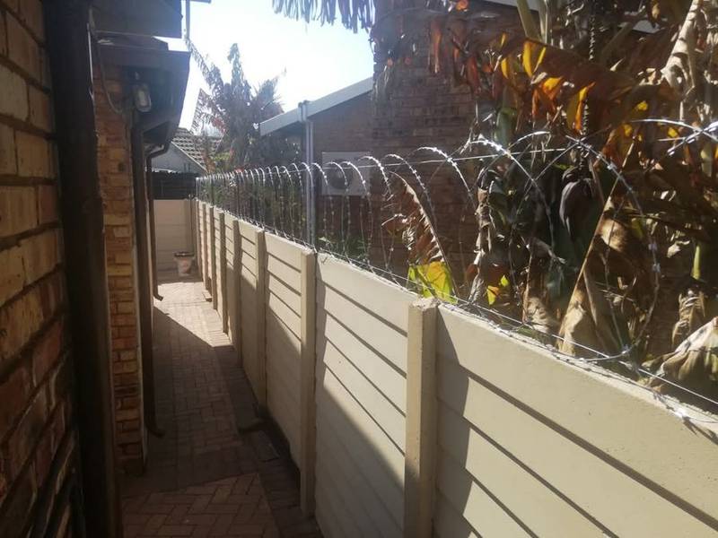 Flat wrap 500mm razor wire fitted on a precast wall at a home in Gauteng